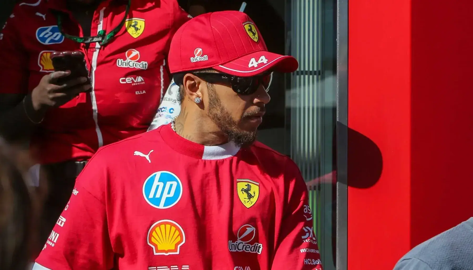 Lewis Hamilton emerging from a race trailer