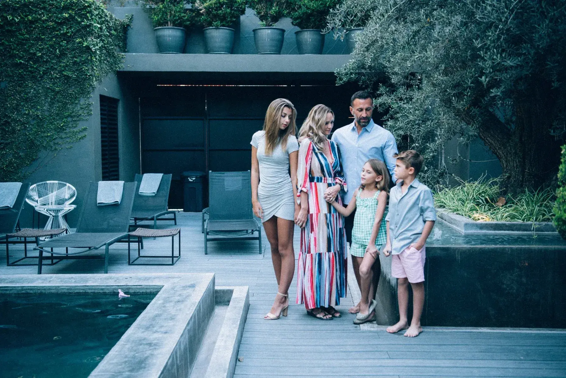 The Lockwood family by a pool