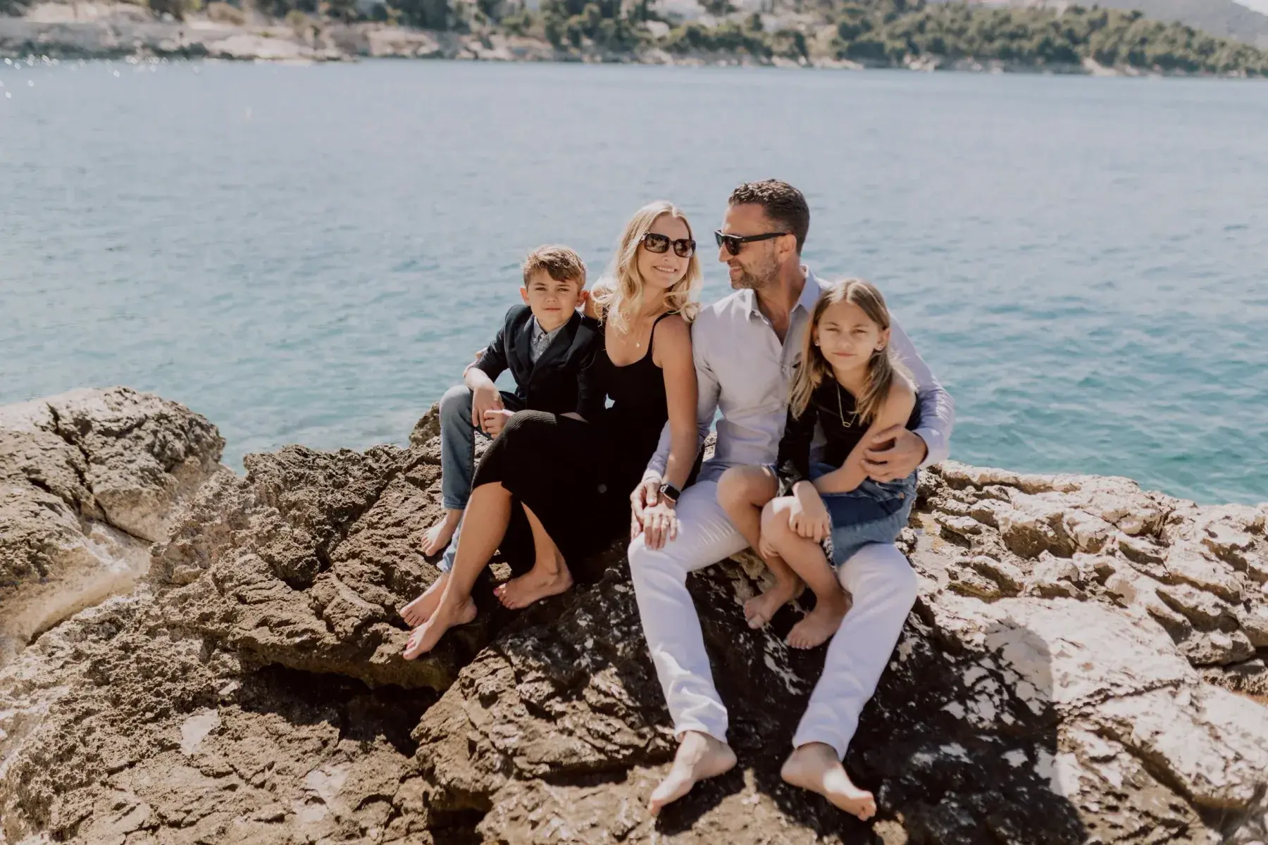 The Lockwood family on a rocky shore in Croatia