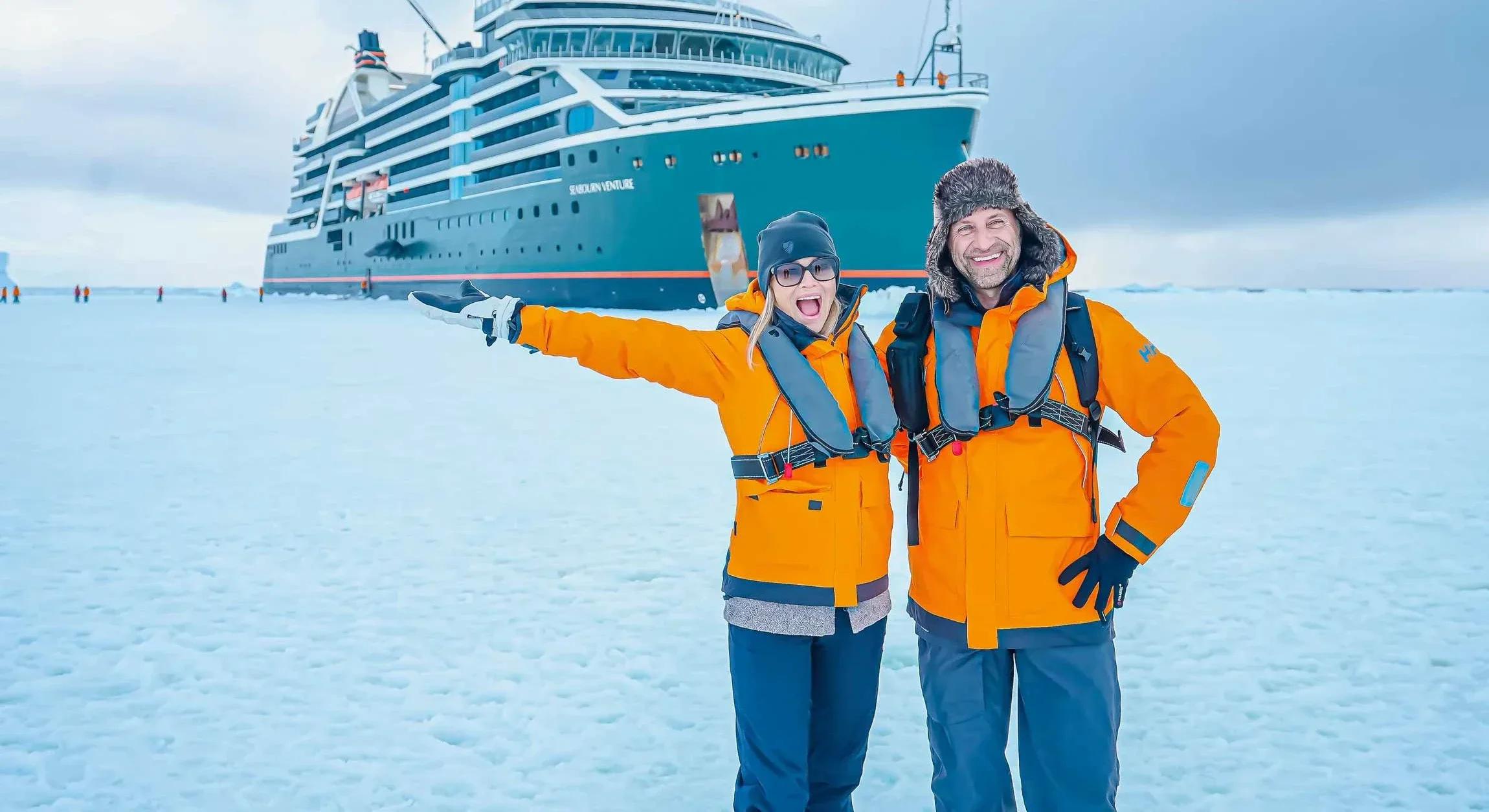 Phil and Erin on the sea ice in front of Seabourn Venture, Antarctica