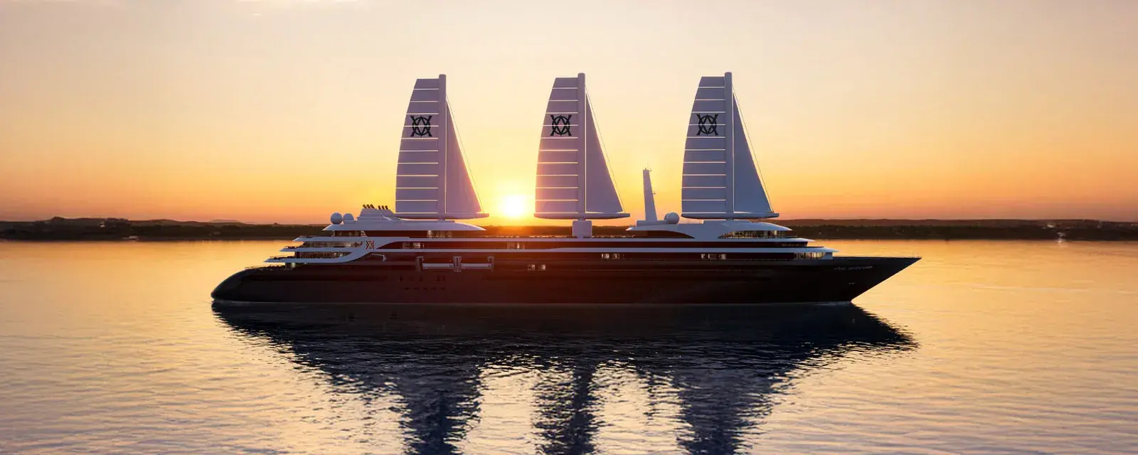 The Atlas Ocean Voyages' Atlas Adventurer sailing yacht at sunset