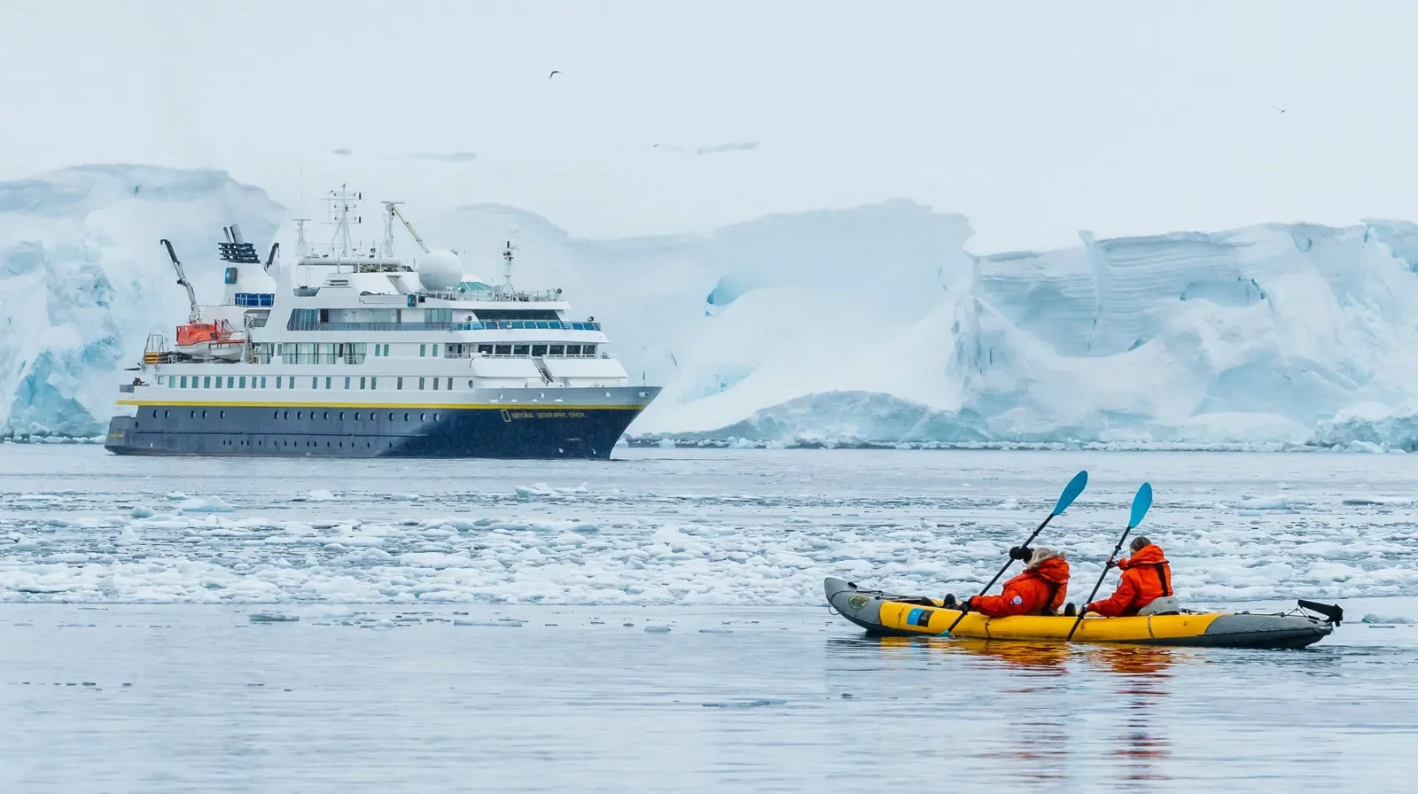 National Geographic Orion anchored in an Antarctic cove