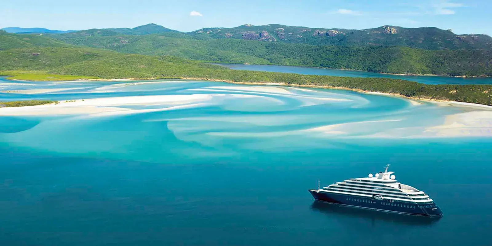 Scenic Eclipse I aerial view in blue waters