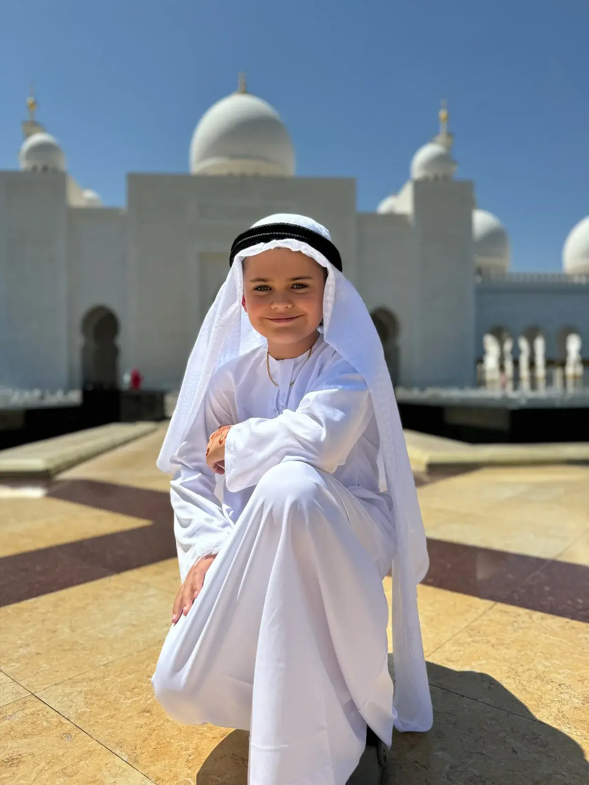 Colt Lockwood in a white kandura at the Sheikh Zayed Grand Mosque in Abu Dhabi