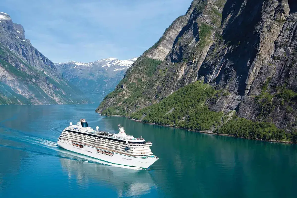 Aerial view of a Crystal Cruises ship in mountain fjord