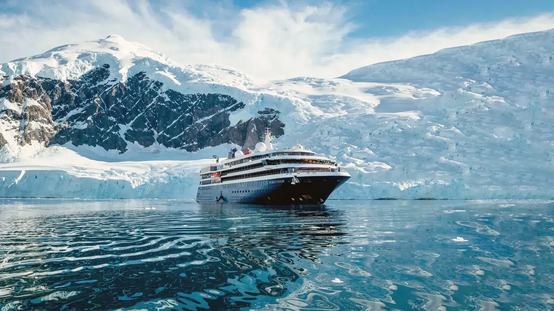 An Atlas Ocean Voyages cruise ship in Antarctica