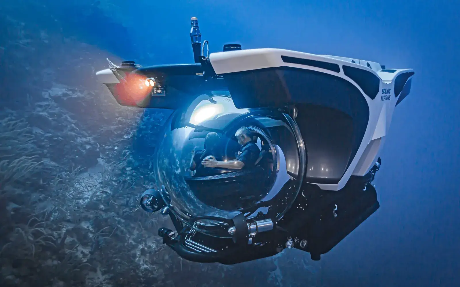 A submarine from the Scenic Eclipse II yacht explores the ocean floor