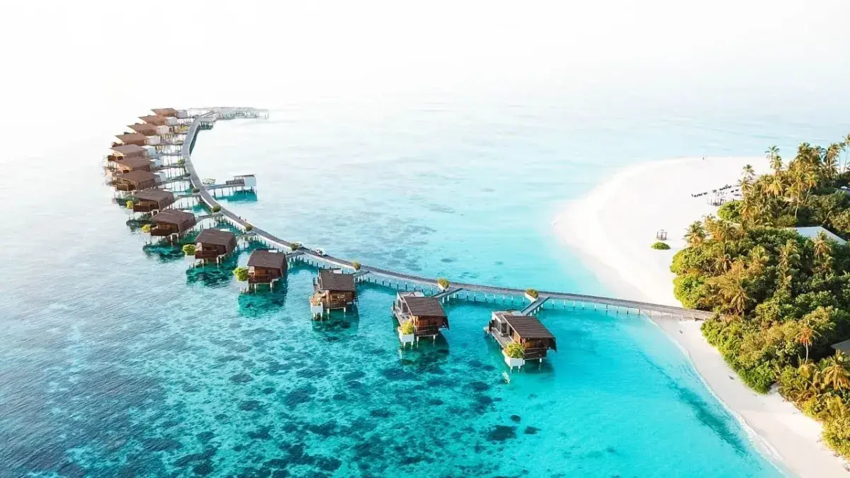 Aerial view of overwater bungalows that are part of the Hyatt hotels family