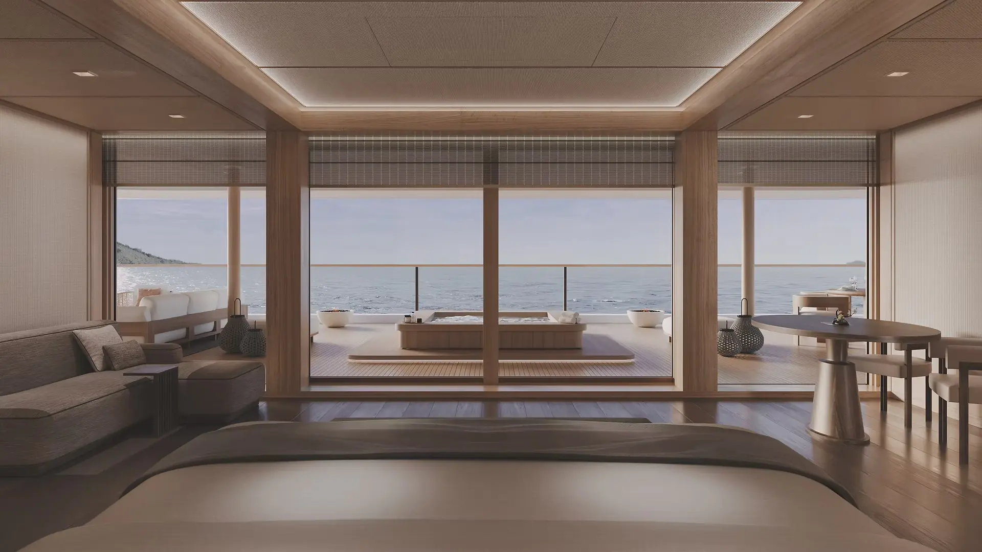 Rendering of a penthouse suite on Amangati, looking past the bed to a private terrace with a soaking tub and the sea