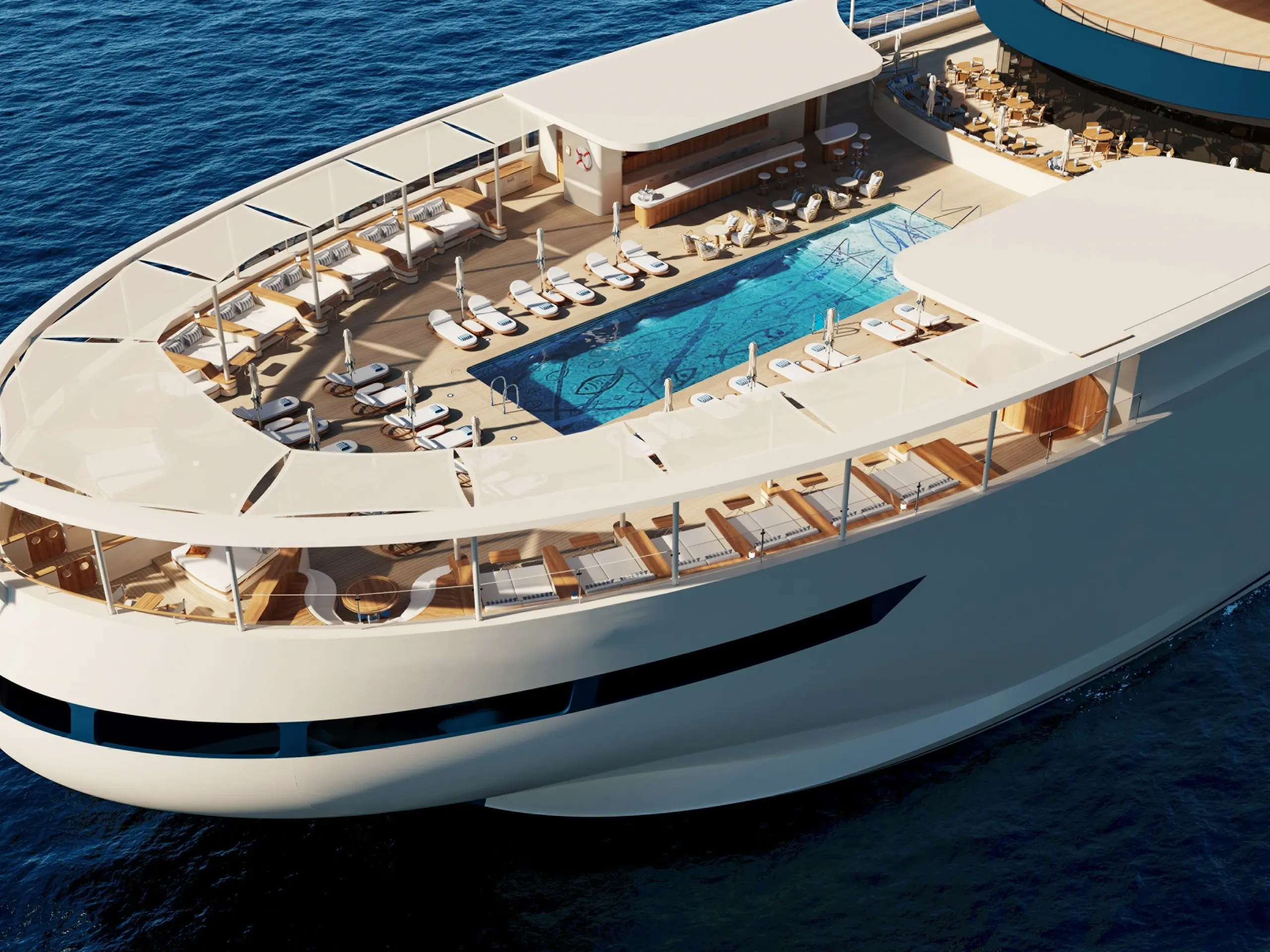 Aerial view of the pool deck on Four Seasons I, ringed by shaded loungers
