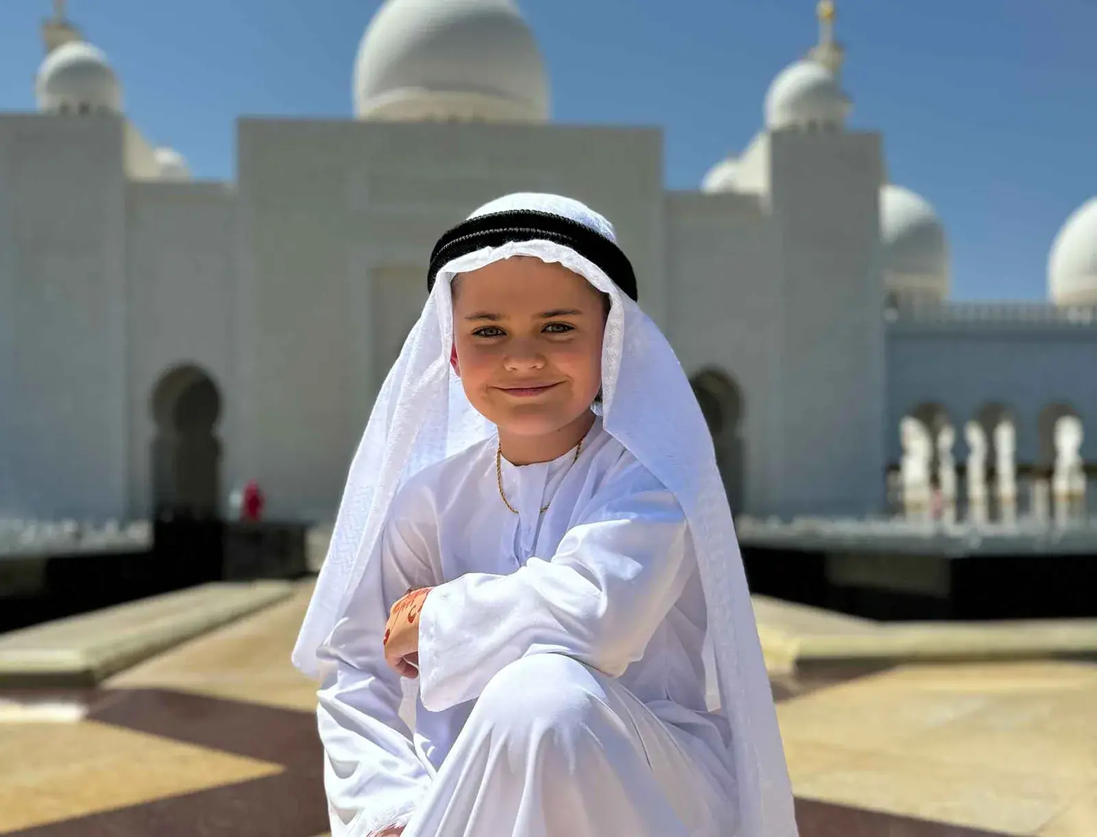 Colt Lockwood poses in front of Abu Dhabi's Sheikh Zayed Grand Mosque