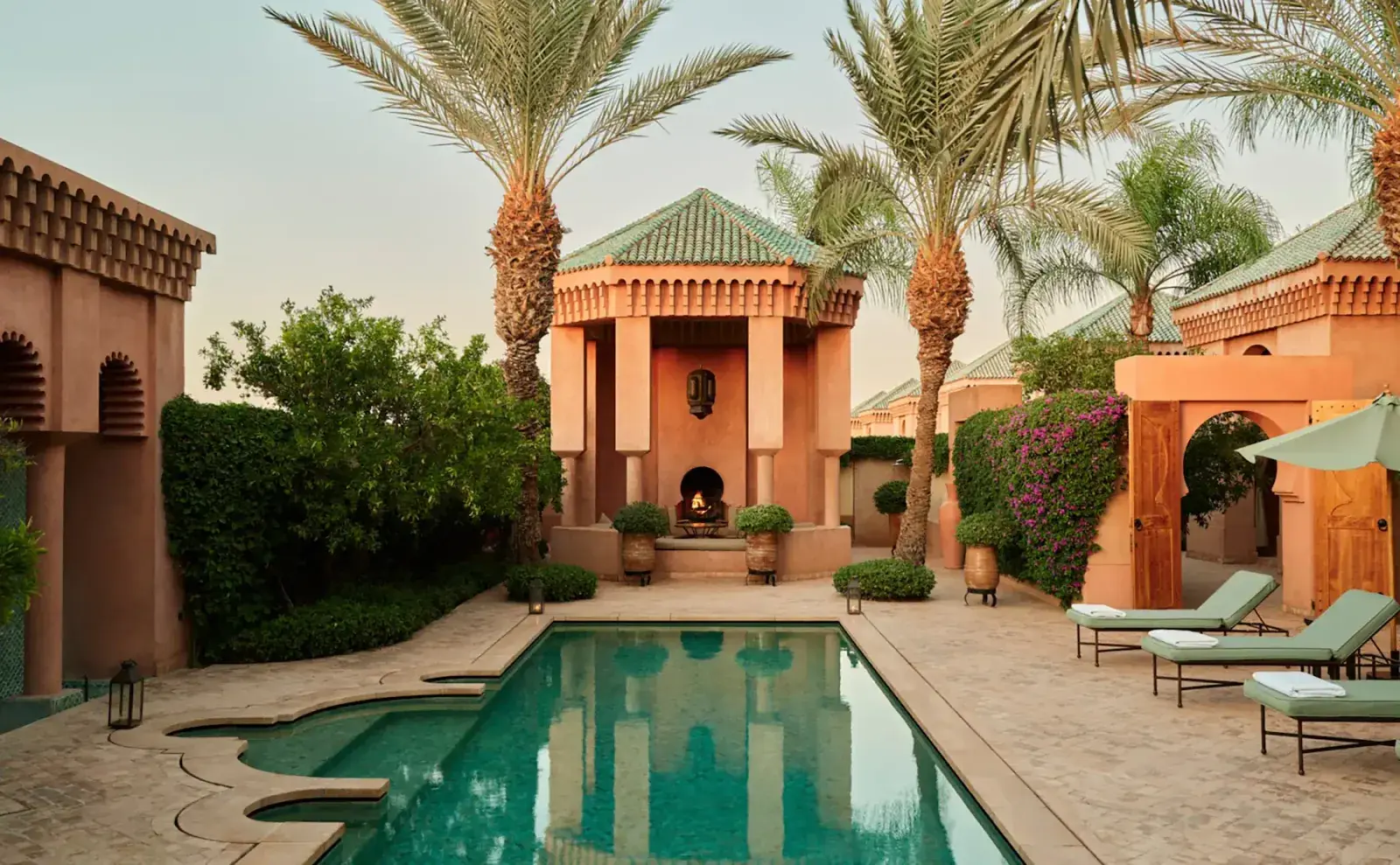 Aerial view of a pool area at an Aman resort