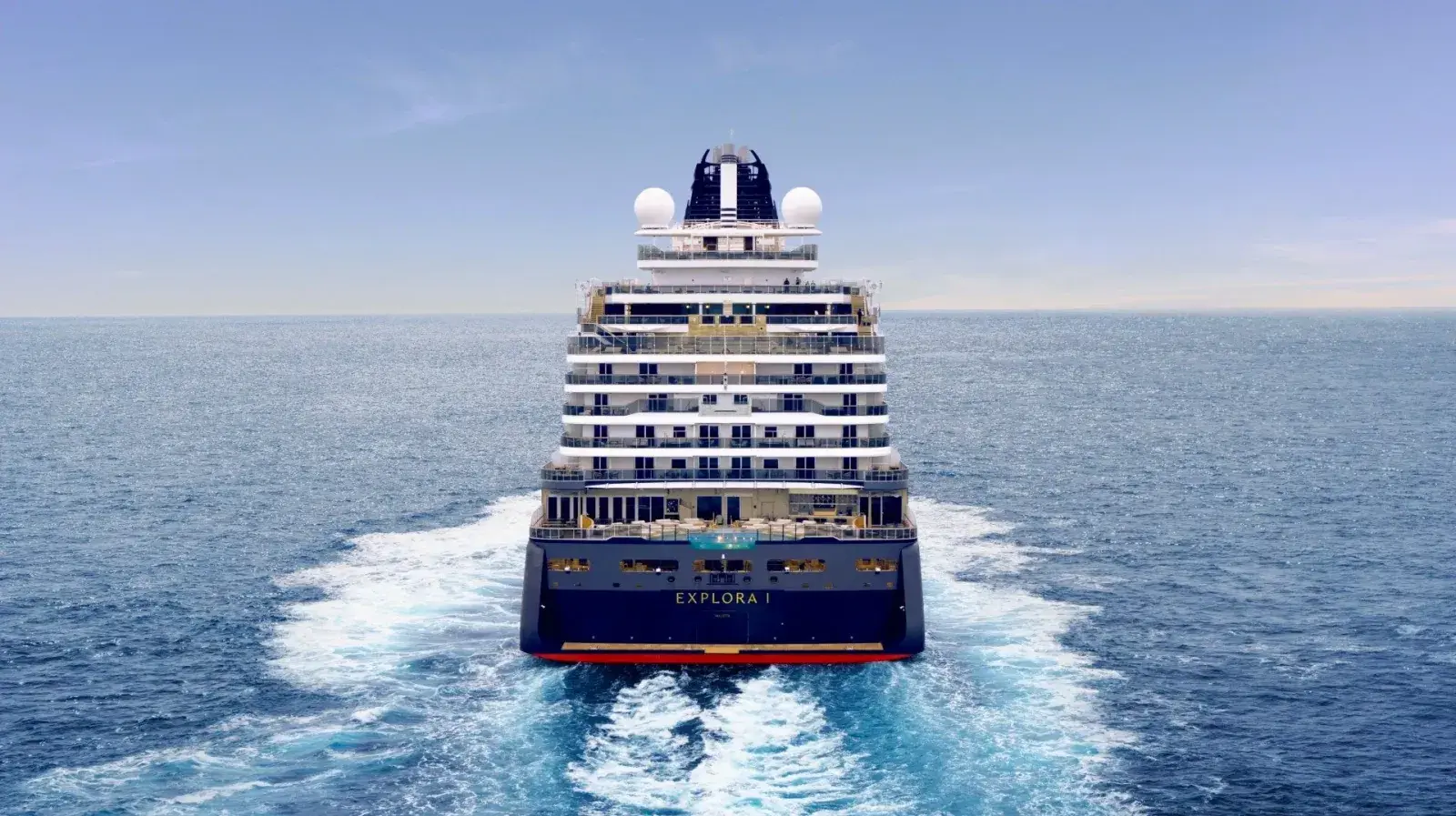 An Explora Journeys cruise ship sails away