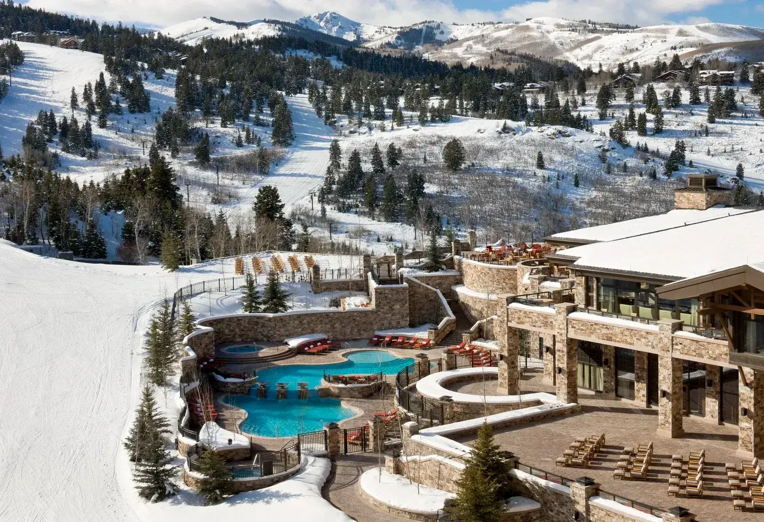 A snowy ski resort with pool