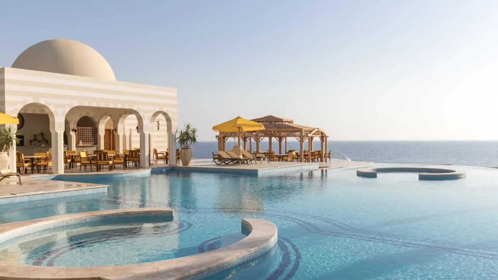 An Oberoi resort pool area
