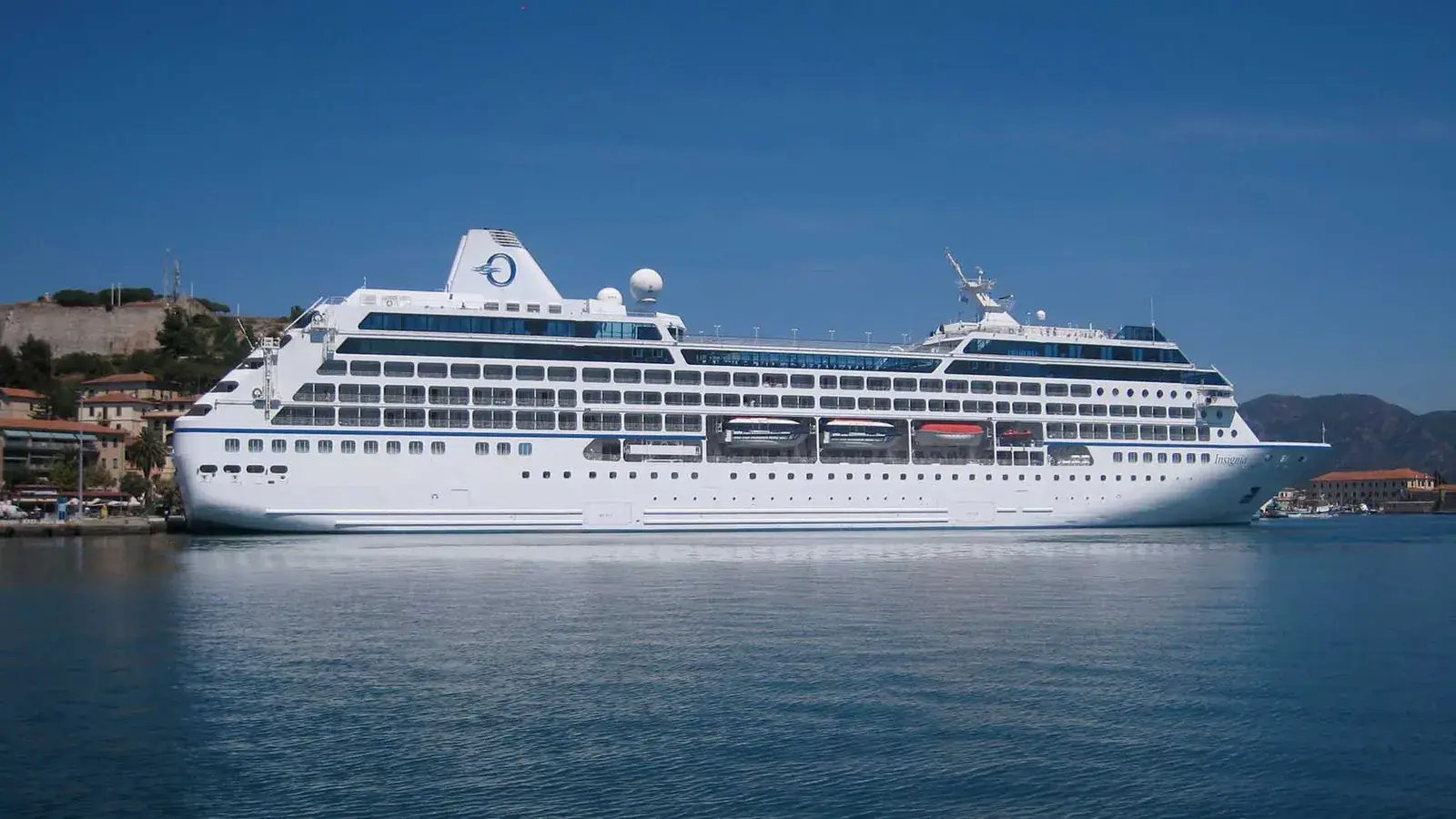 Oceania Insignia cruise ship at port, side view