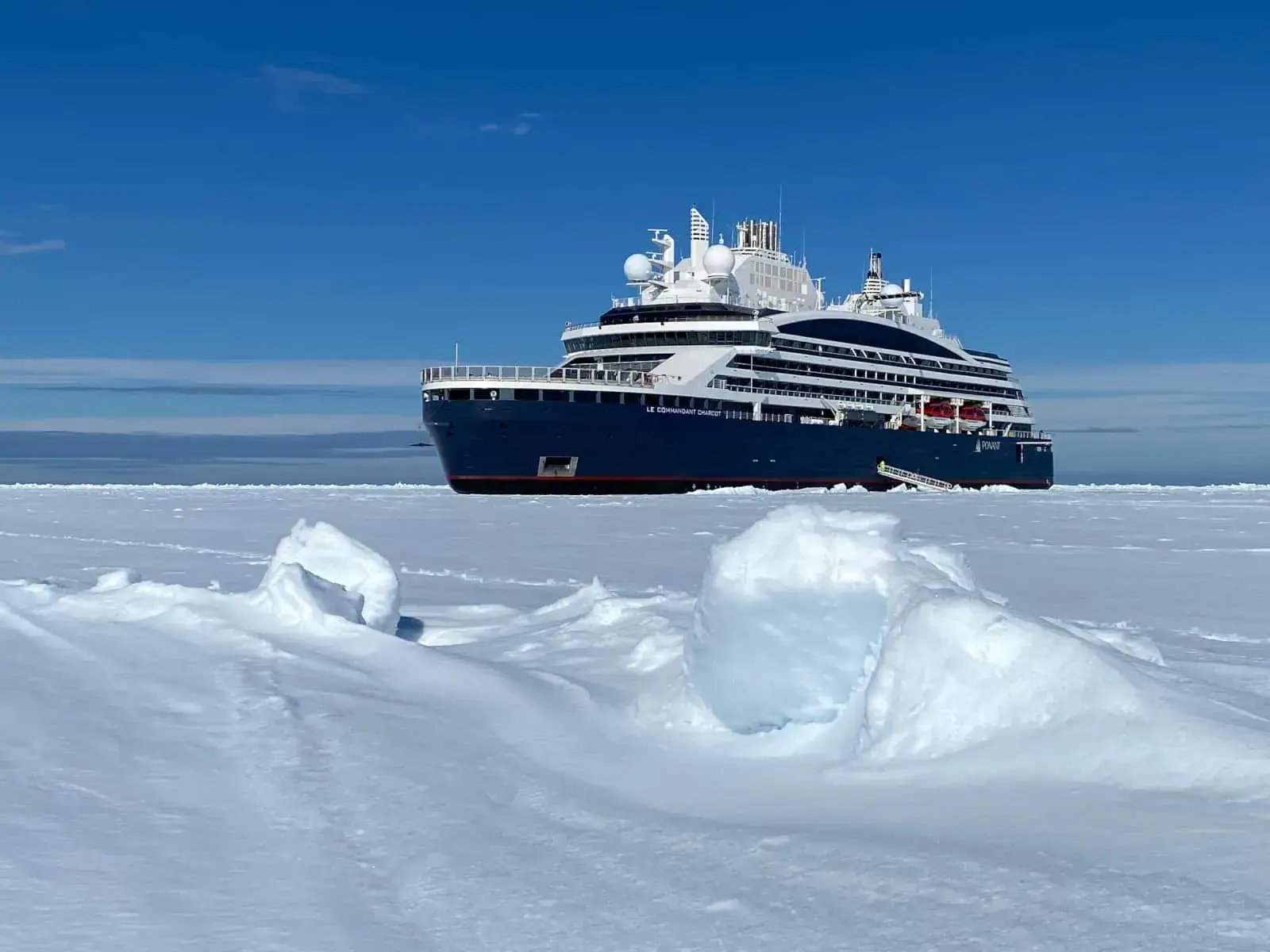 A Ponant expedition cruise ship stops in an ice sheet