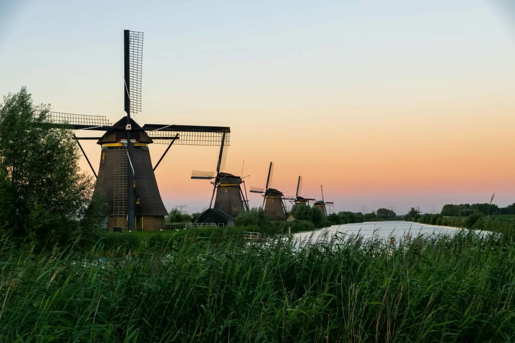 Windmills at sunrise in the Netherlands
