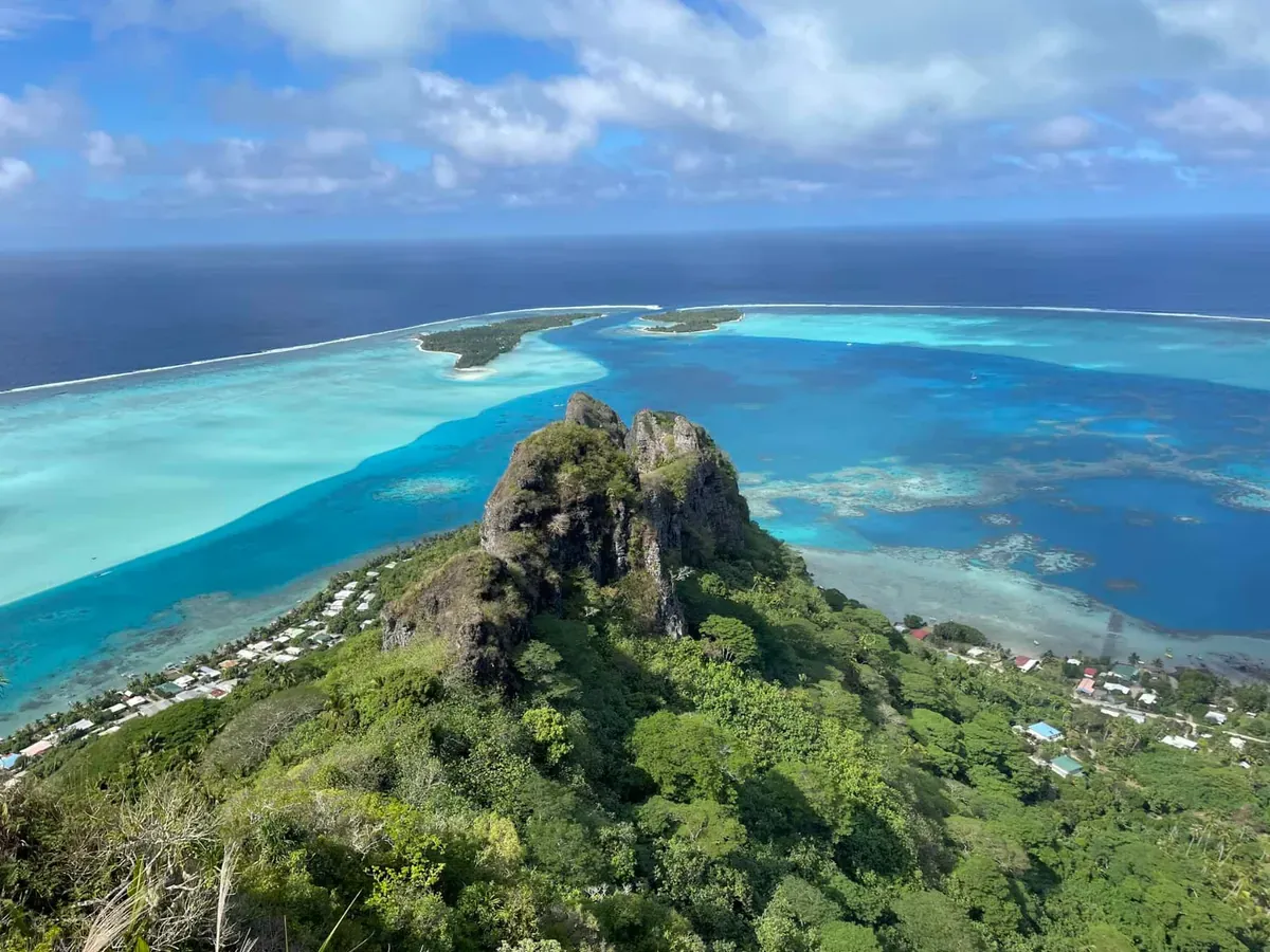 Aerial of peaks and waters of Tahiti