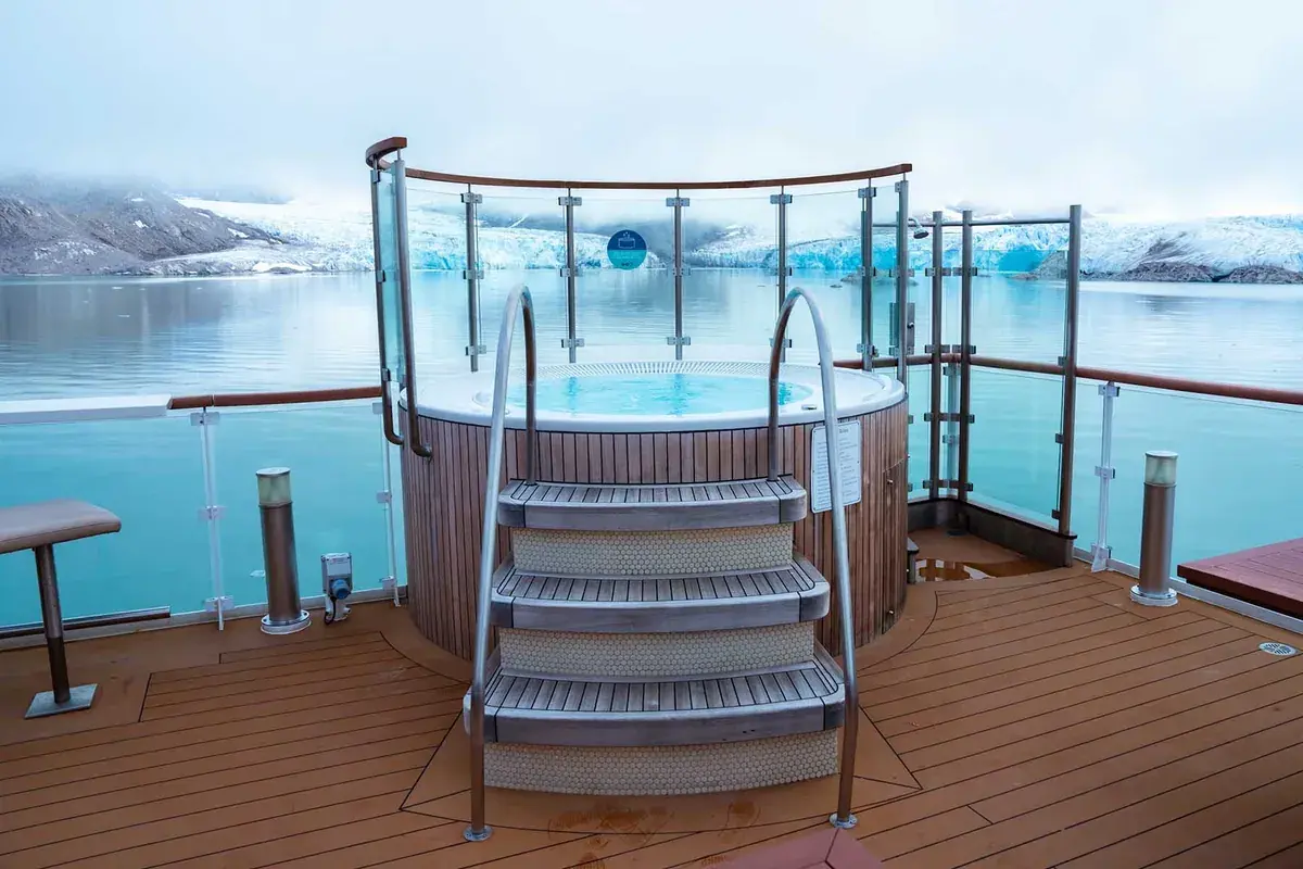 Greg Mortimer outdoor jacuzzi on deck with polar views
