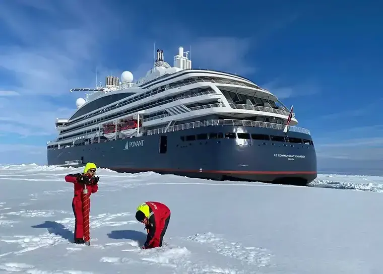 Helicopter taking off from Le Commandant Charcot polar expedition