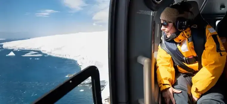 Helicopter passenger view over polar landscape from Ultramarine
