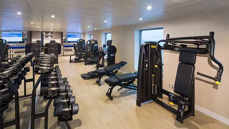 Fitness center aboard Windstar Star Breeze with cardio and strength equipment