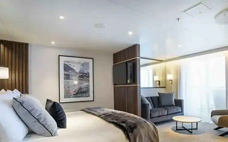 Quark Ultramarine Penthouse Suite with expanded seating area and private balcony
