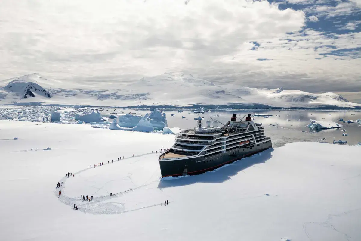 The Seabourn Venture cruise ship is pushed into Antarctica ice