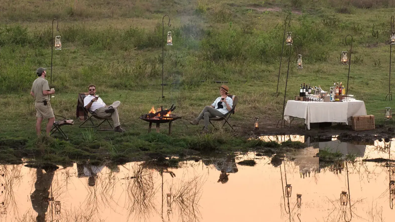 Guests enjoy a South African safari sundowner