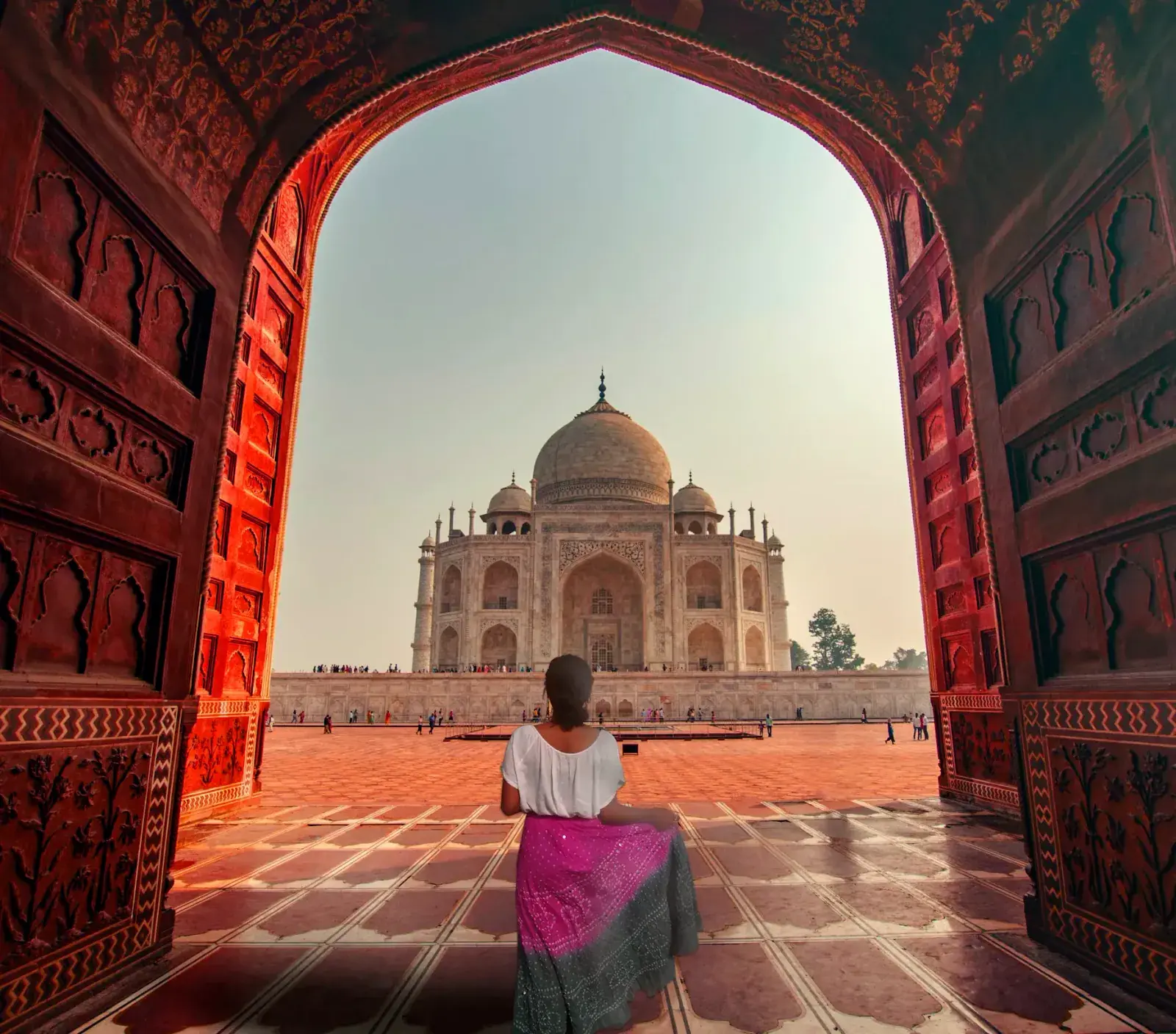 Woman gazing at the Taj Majal