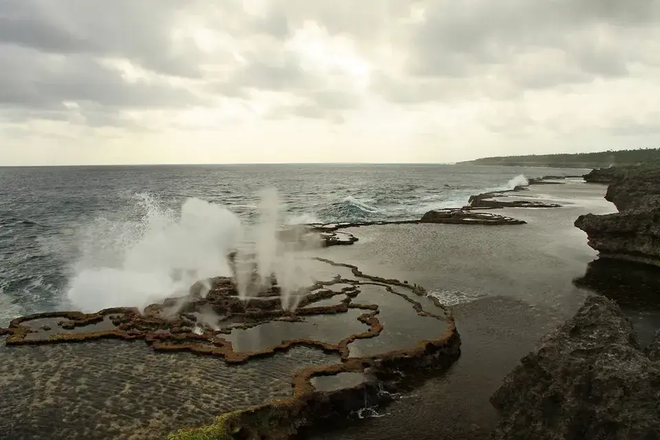 Waves crash along a shore in Tonga
