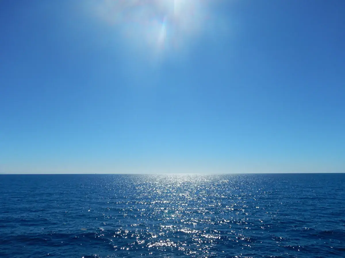 The sun shining down on blue waters of the South Pacific