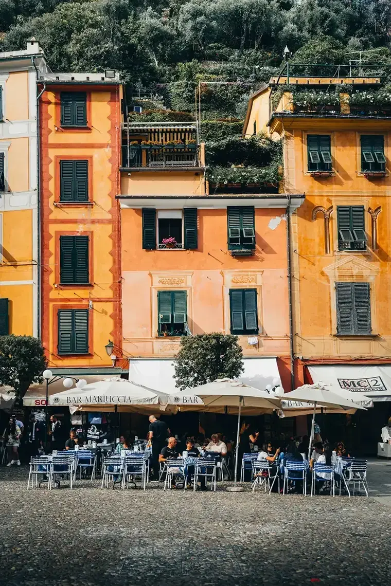 Pretty architecture and hills in Portofino, Italy