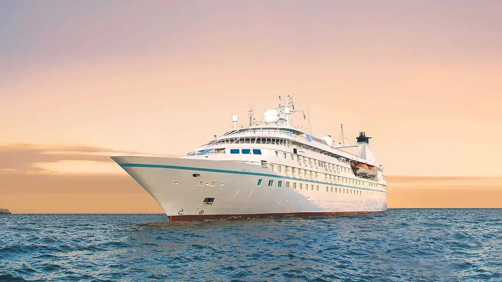 Windstar Star Breeze sailing at golden sunset, main exterior view