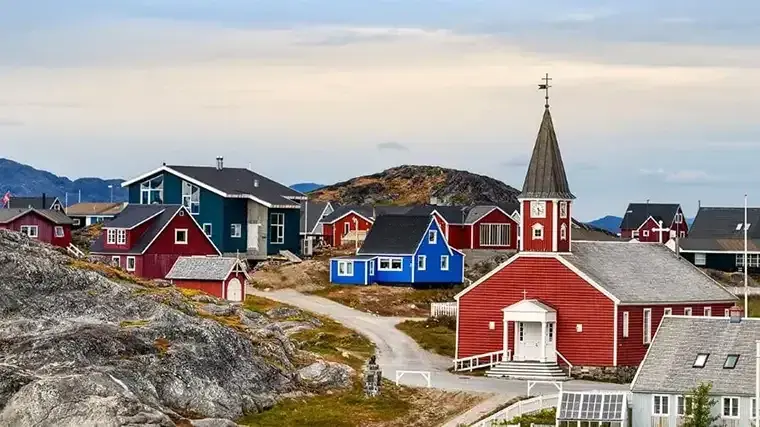 Colorful buildings in a Greenland landscape