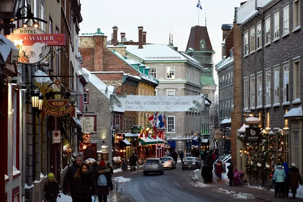 Old Quebec City as snow falls on the street