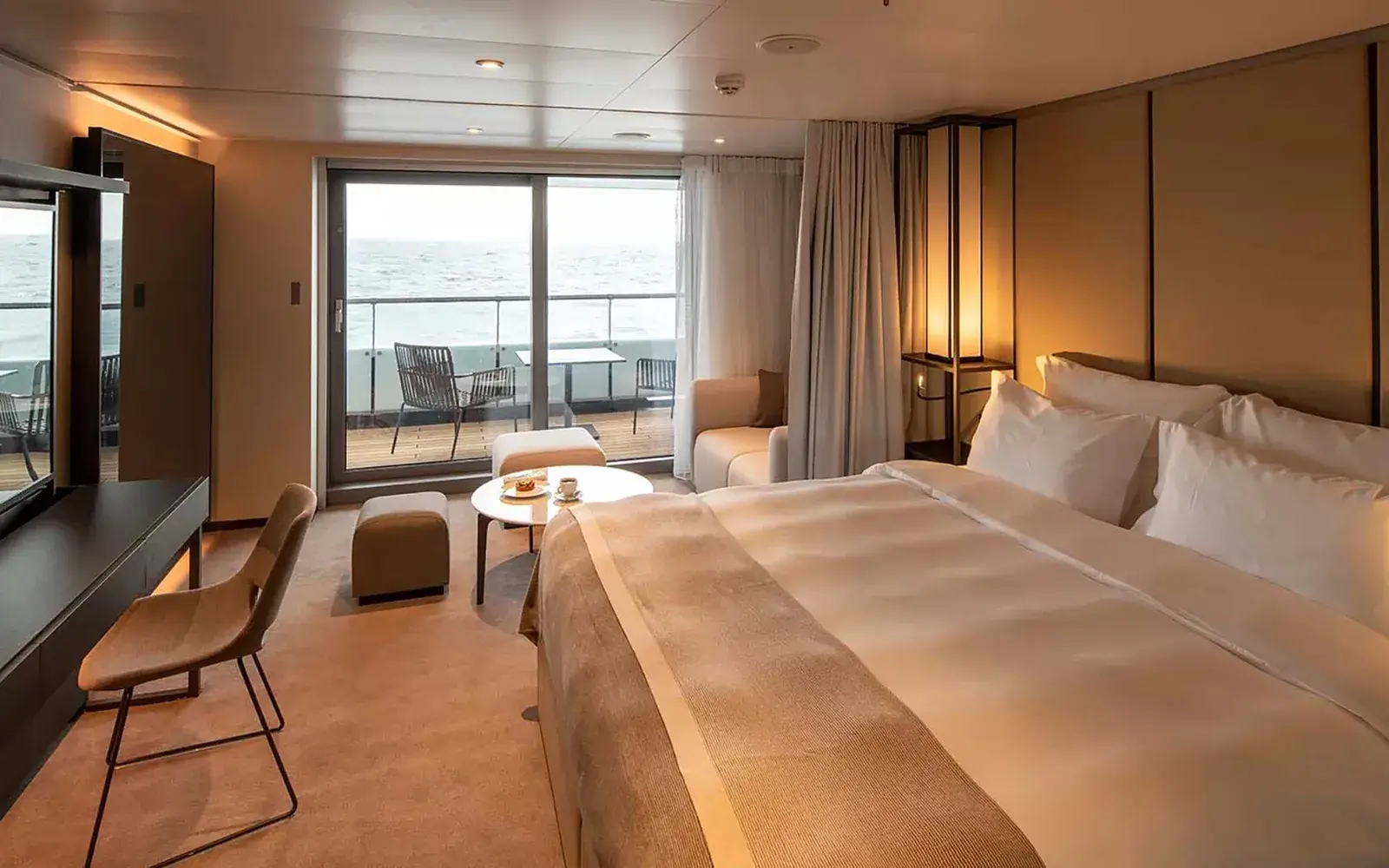 Scenic Eclipse deluxe verandah suite with private balcony and ocean view