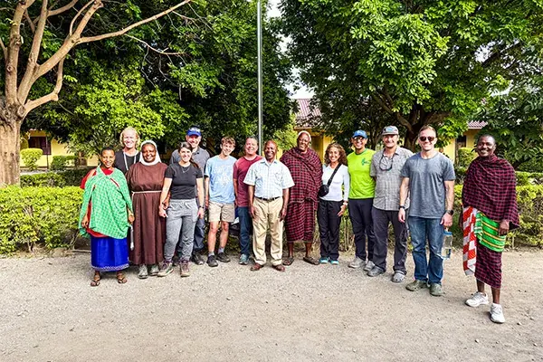 Visitors pose at The O’Brien School for the Massai