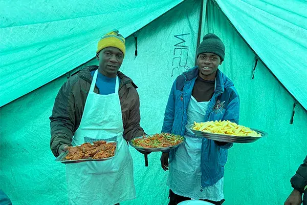 Locals display meals in a tent on Kilimanjaro