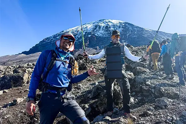 Hikers pose on Kilimanjaro