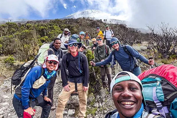 Hikers pose near the summit on Kilimanjaro