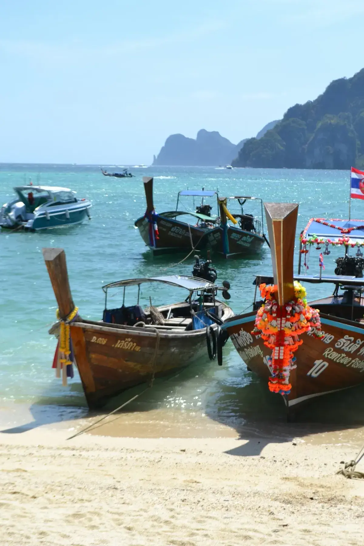 Boats along the beach of the Andaman sea