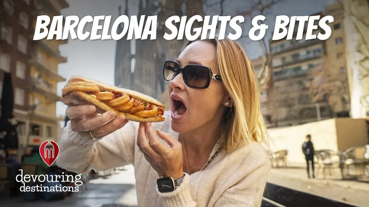 Erin Lockwood eating a massive sandwich in Barcelona