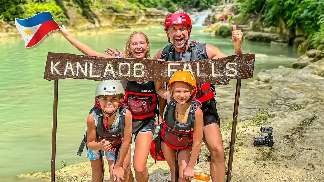 The Lockwood family canyoneering and cliff jumping at Kanlaob Falls in Alegria, Cebu, Philippines