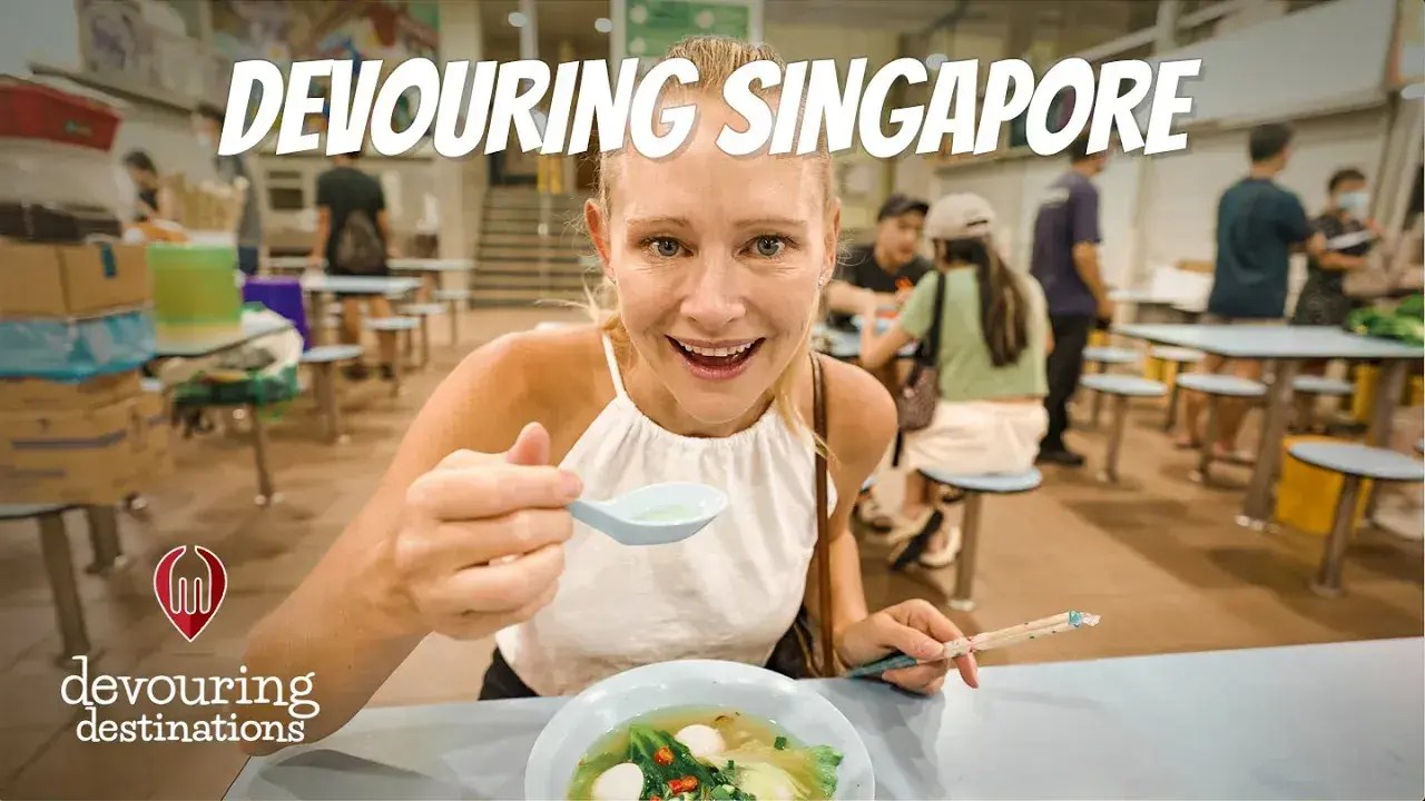 Erin Lockwood eat soup at a Singapore Hawker stall