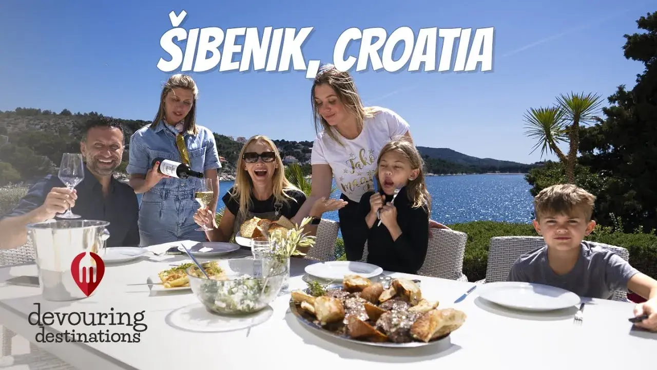 The Lockwood family cooking a Croatian meal with local chefs in Primošten, Croatia