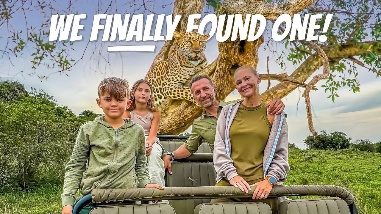 The Lockwood family on a safari jeep with a leopard