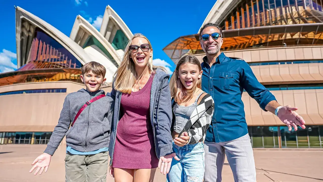 The Lockwood family, posing in front of the Sydney Opera House